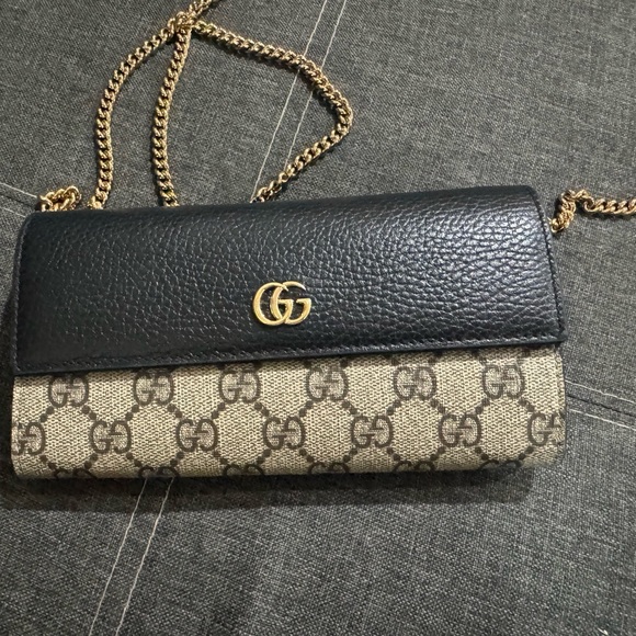 Gucci Handbags - Authentic Gucci Black Leather and Tan GG Clutch
Gucci Marmont